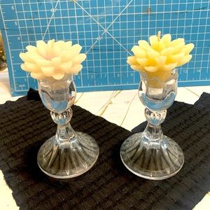 Set of floral candles and holders